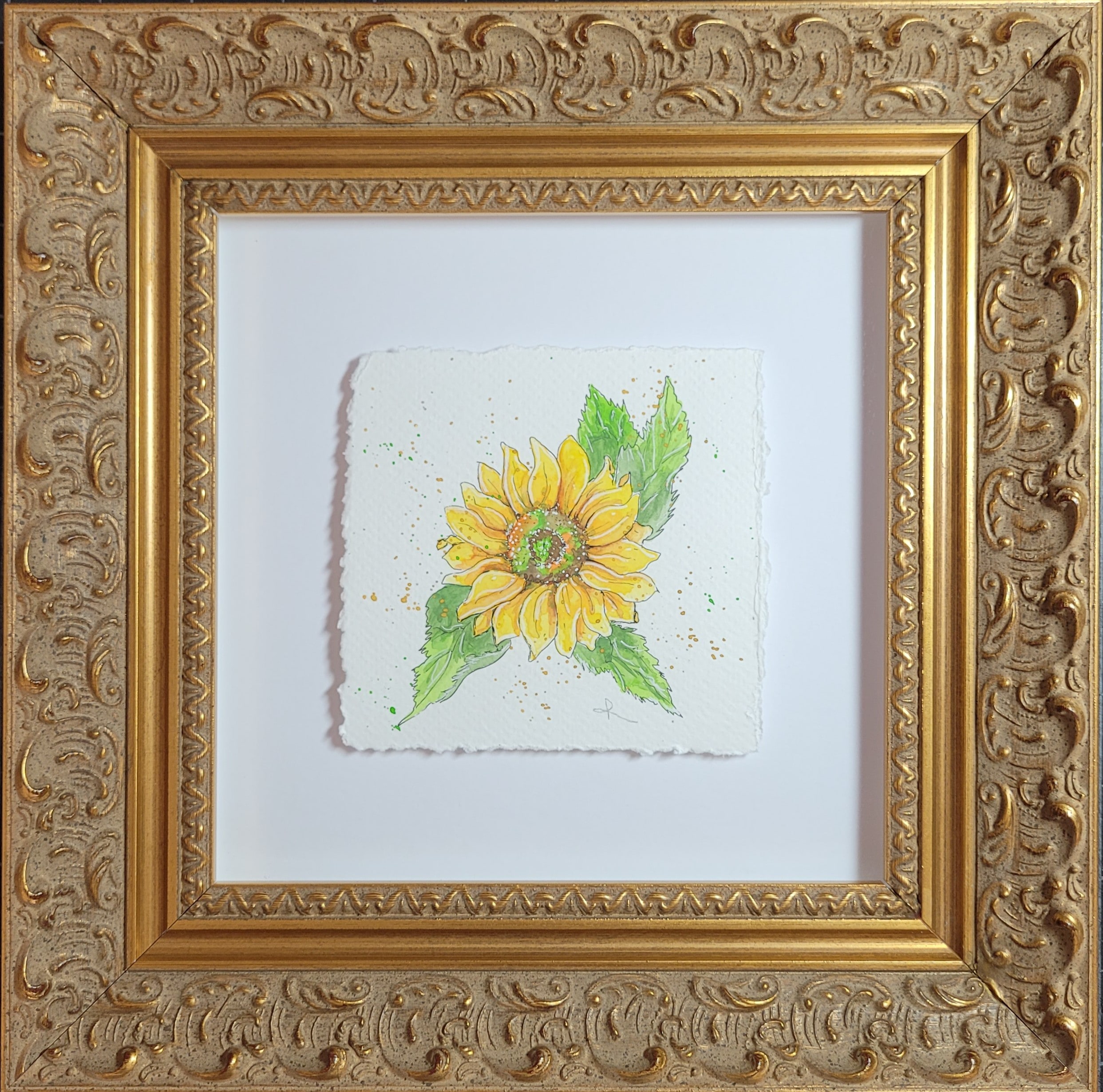 Watercolor and ink sunflower on deckled paper in an ornate gold frame by Roxanne Langley