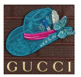 Embroidered turquoise cowboy hat with butterfly on brown Gucci leather, mixed media by Stephen Wilson