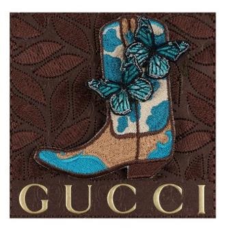 Embroidered cowboy boot with teal butterflies on brown Gucci leather, mixed media by Stephen Wilson