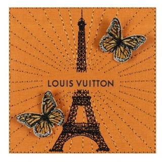 Stitched Eiffel Tower with monarch butterflies on orange Louis Vuitton linen, mixed media by Stephen Wilson