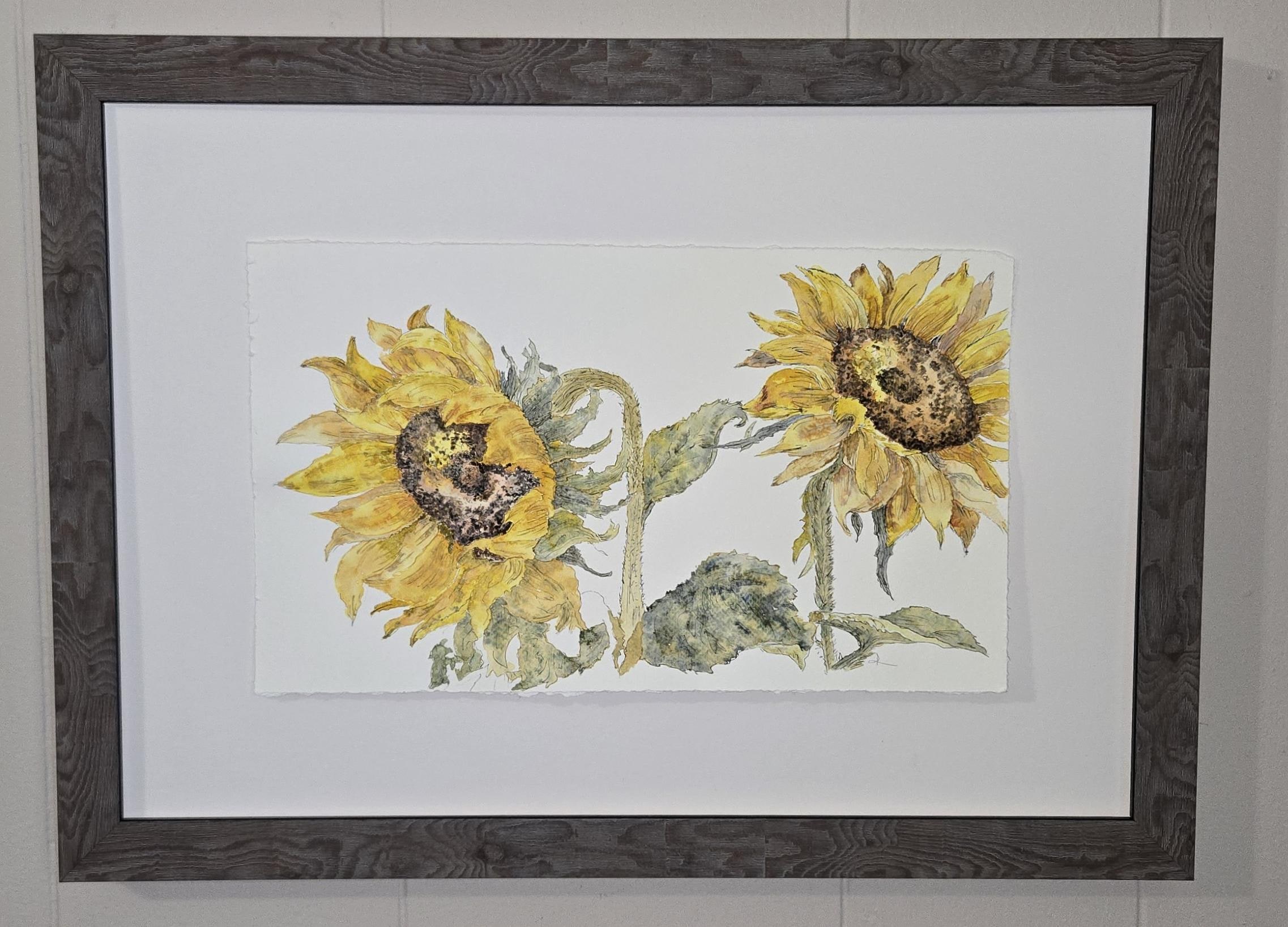 Framed watercolor and ink of two golden sunflowers on deckle-edged paper by Roxanne Langley