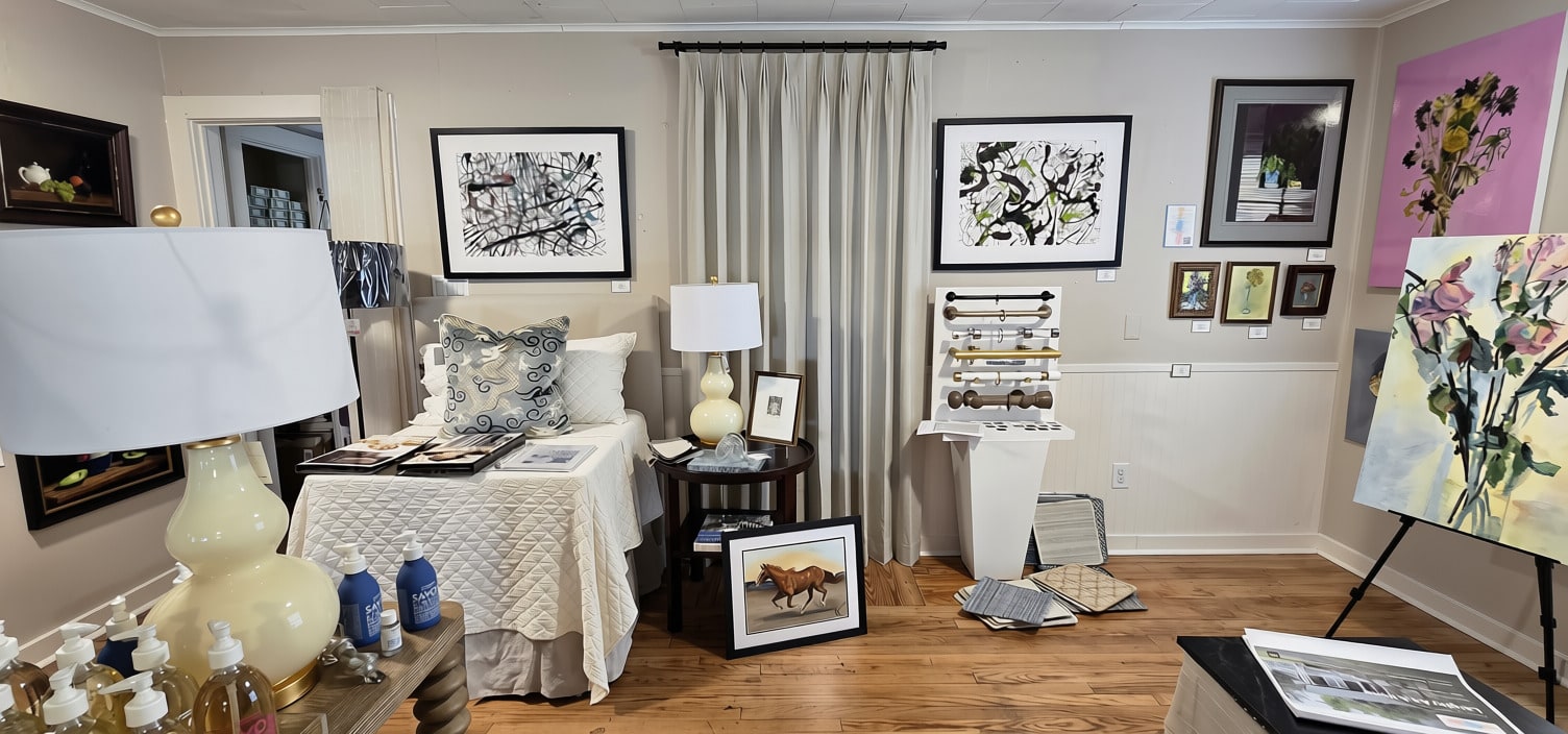 Gallery room at Langley Art & Home with original artwork, bedding display, and drapery hardware
