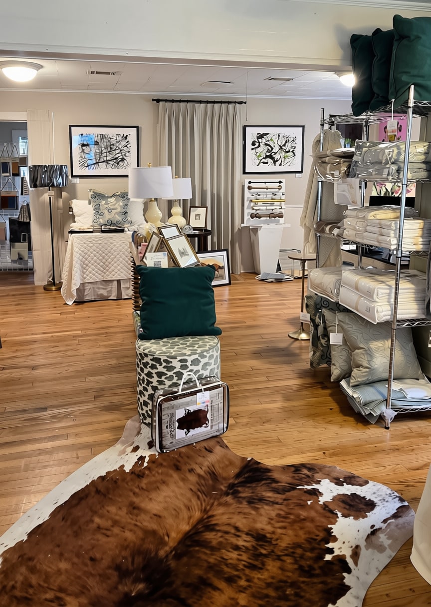 Curated art and home decor vignette inside Langley Art & Home