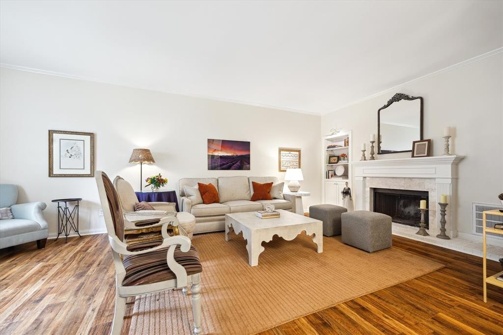 A living area install by Langley Art & Home with layered textiles and art